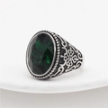 Vintage stainless steel ring with a large oval emerald green gemstone and ornate engraving - US 7 / Green Stone