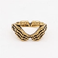 Vintage gothic golden skeleton hand heart ring made of retro style titanium steel metal - US 7 / Gold