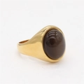 Bague minimaliste en acier titane doré avec un grand œil de chat ovale marron - Pierre Café Dorée