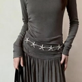 Silver metal chain belt for women featuring detailed starfish charms on a grey dress - White Starfish Metal Waist Chain K0385b
