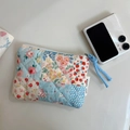 Quilted floral cotton coin pouch with zipper and simple wish label detail - Blue and Red Floral Patchwork