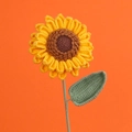 Handmade crochet sunflower with bright yellow petals and green leaves for home decor - Yimian Double-layer Sunflower Branches