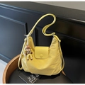 Versatile yellow nylon tote bag with cartoon charm and pearl chain accent in casual style - Yellow with Pendant