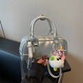 Silver metallic bowling bag with fuzzy charm and strap in modern Y2K fashion style - Silver (With Pendant)