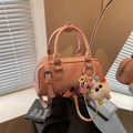 Pink retro bowling handbag with plush pompom heart charm and adjustable shoulder strap - Pink with Pendant