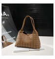 Detailed close-up of brown leather hobo bag with silver grommets and rivet hollow-out design - Small Eyelet / Brown