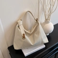 Chic cream white pleated hobo bag with knotted strap and brown leather accents - White