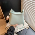 Mint green litchi grain crossbody bucket bag with cute cartoon rabbit pendant charm - Green