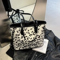 Grote shopper tas van canvas met zwart-witte luipaardprint en zwart lederen handvaten - Luipaardprint Wit