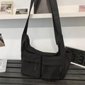 Large black nylon crossbody messenger bag with adjustable strap and front pockets - Black