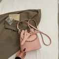 Pink lychee texture bucket bag with silver chain strap and snap button closure - Pink (No Charm)