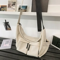 Off-white large capacity messenger bag with multi-pocket nylon design and wide strap - Off White