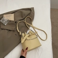 Minimalist light yellow bucket bag with silver chain strap and lychee leather texture - Yellow (No Pendant)