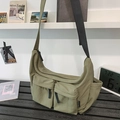 Olive green nylon crossbody bag with multi-pocket workwear style and black strap - Green