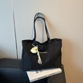 Minimalist black canvas tote bag with TaoCaitu embroidery and moon plush charm decoration - Black with Pendant