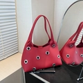 Chic red shoulder bag with lychee leather texture and silver metallic eyelet accents - Large Eyelet Red