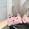 Pink lychee texture shoulder bag with large silver grommets and adjustable long strap - Large Eyelet Pink