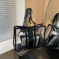 Transparent PVC tote bag with black leather trim and matching inner zipper pouch - Clear