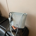 Light blue woven bucket bag featuring stylish dual straps and a premium texture finish - Blue