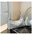 Silver metallic hobo shoulder bag featuring round stud accents and sleek crescent shape - Silver