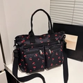 Korean style black tote bag with red cherry patterns and multi-pocket functional design - Black
