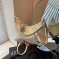 Chic beige hobo shoulder bag in premium pebble leather with elegant silver bead detail - With Charm / Off White