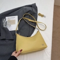 Bright yellow dumpling crossbody bag with lychee texture and silver logo detail - No Pendant / Yellow