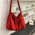 Large red slouchy crossbody shoulder bag with drawstring closure in casual minimalist style - Red