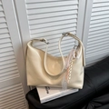 Minimalist cream white crossbody dumpling bag with lace tassel and metal buckle detail - White with Pendant
