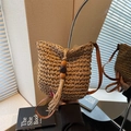Straw bucket bag in dark khaki with wooden beads and tassel decoration - Brown