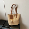 Beige woven straw tote bag with brown leather straps and yellow bead tassel pendant - Khaki