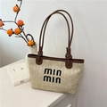 Beige woven straw tote bag with black min min embroidery and brown leather handles - min min Embroidered Style (Coffee) / Coffee