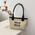 Beige woven straw tote bag with black handles and min min knit lettering detail - min min Embroidered Style (Black)