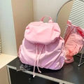 Pink pleated drawstring backpack with flap closure and side pockets for daily travel - Pink