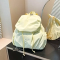 Light yellow lightweight pleated nylon backpack with drawstring closure and side pockets - Yellow