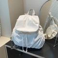 Minimalist white puffy nylon backpack featuring drawstring flap closure for women - White