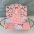 Detail of pink laser-cut princess invitation with floral lace pattern and RSVP card - Pink