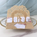 3D laser-cut wedding invitation showing a couple under a rose arch with gold finish - Beige Gold