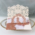 Close-up of laser-cut wedding card featuring a 3D silhouette and rose gold glitter details - Glitter Champagne Gold