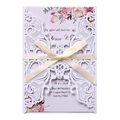 Lace laser cut wedding invitation with floral inner card and cream ribbon bow - White