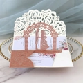 Detail of rose gold laser-cut 3D wedding invitation with rose pattern and glitter finish - Glitter Champagne Gold