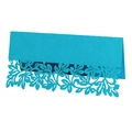 Macro view of blue laser-cut place card with detailed hollow leaf and floral patterns - Sky Blue
