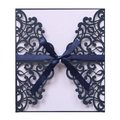 Detail of laser-cut navy blue wedding invitation cover with elegant ribbon bow - Magic Blue