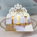 Intricate laser-cut 3D wedding invitation with gold silhouette of a couple on a tray - Reflective Gold