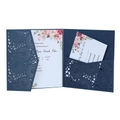 Detail of laser cut navy blue wedding invitation with pink floral inner card - Magic Blue