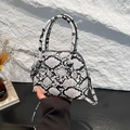 Mini shell handbag in black and white snakeskin pattern with top handles and strap - Snake Pattern White