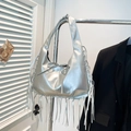 Metallic silver hobo bag with fringe trim and bow detail in a stylish mirror finish - Silver