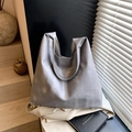 Minimalist grey large capacity tote bag in glossy faux leather with integrated handles - Gray