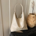 Minimalist cream-colored faux leather large capacity tote bag with wide shoulder strap - Off White