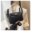 Minimalist black lychee leather handbag with silver twist lock and crossbody strap - Black